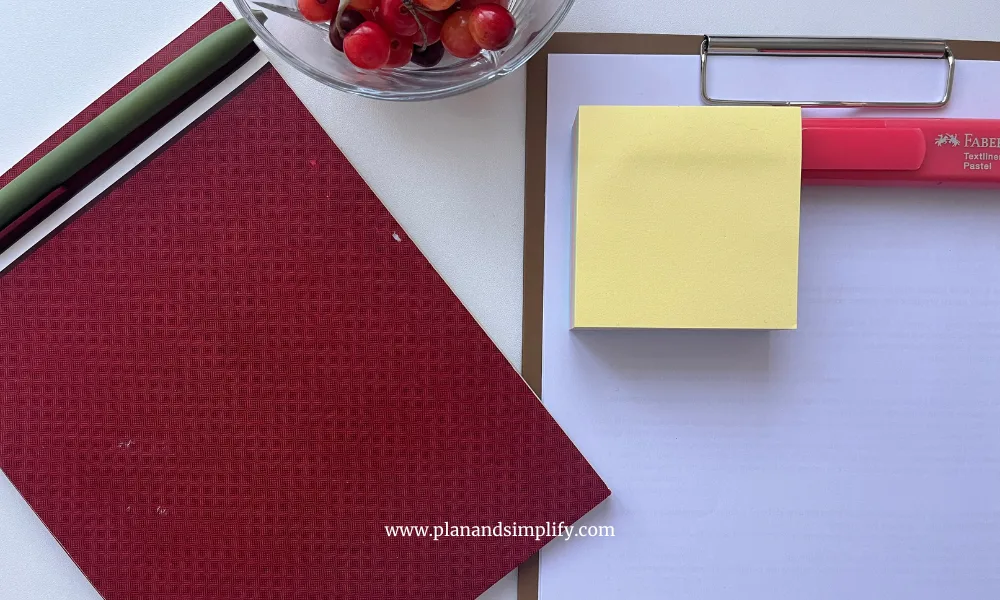 Two notepads on a desk, organizing work to have better focus