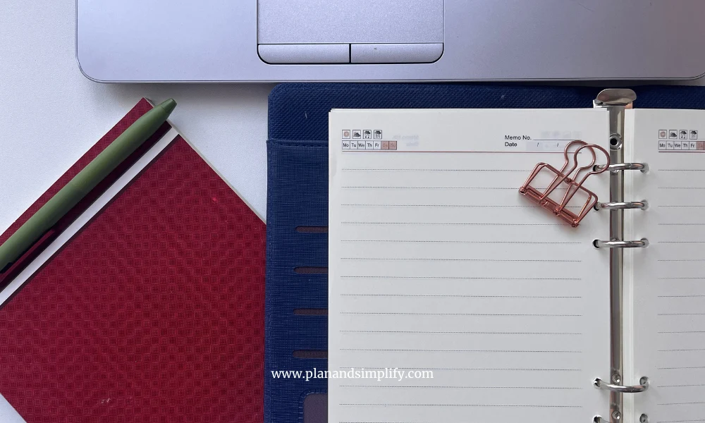 Two notepads and a laptop, for maximum work focus